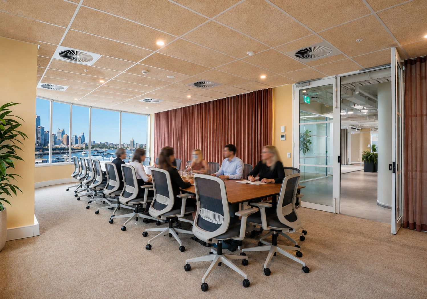 Premium Sydney boardroom with Darling Harbour views, modern conference table, ergonomic seating and professionals collaborating during a business meeting.