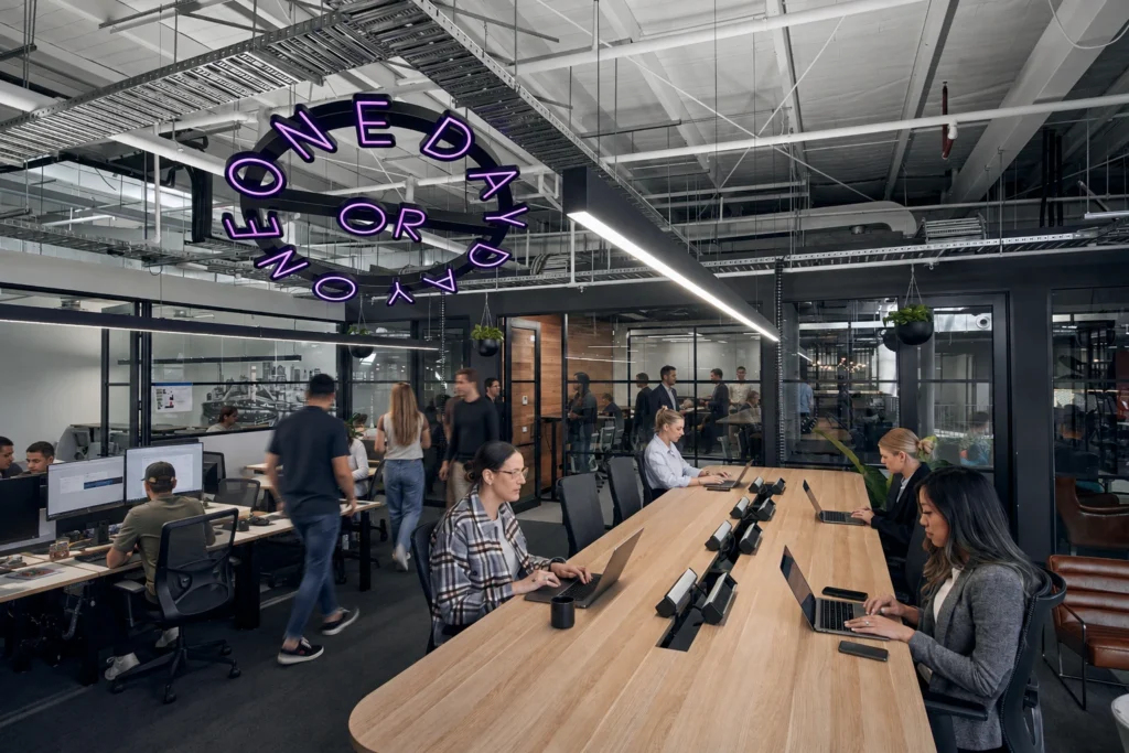 Small business team collaborating in a modern CorporateCubes.Co coworking space in Australia