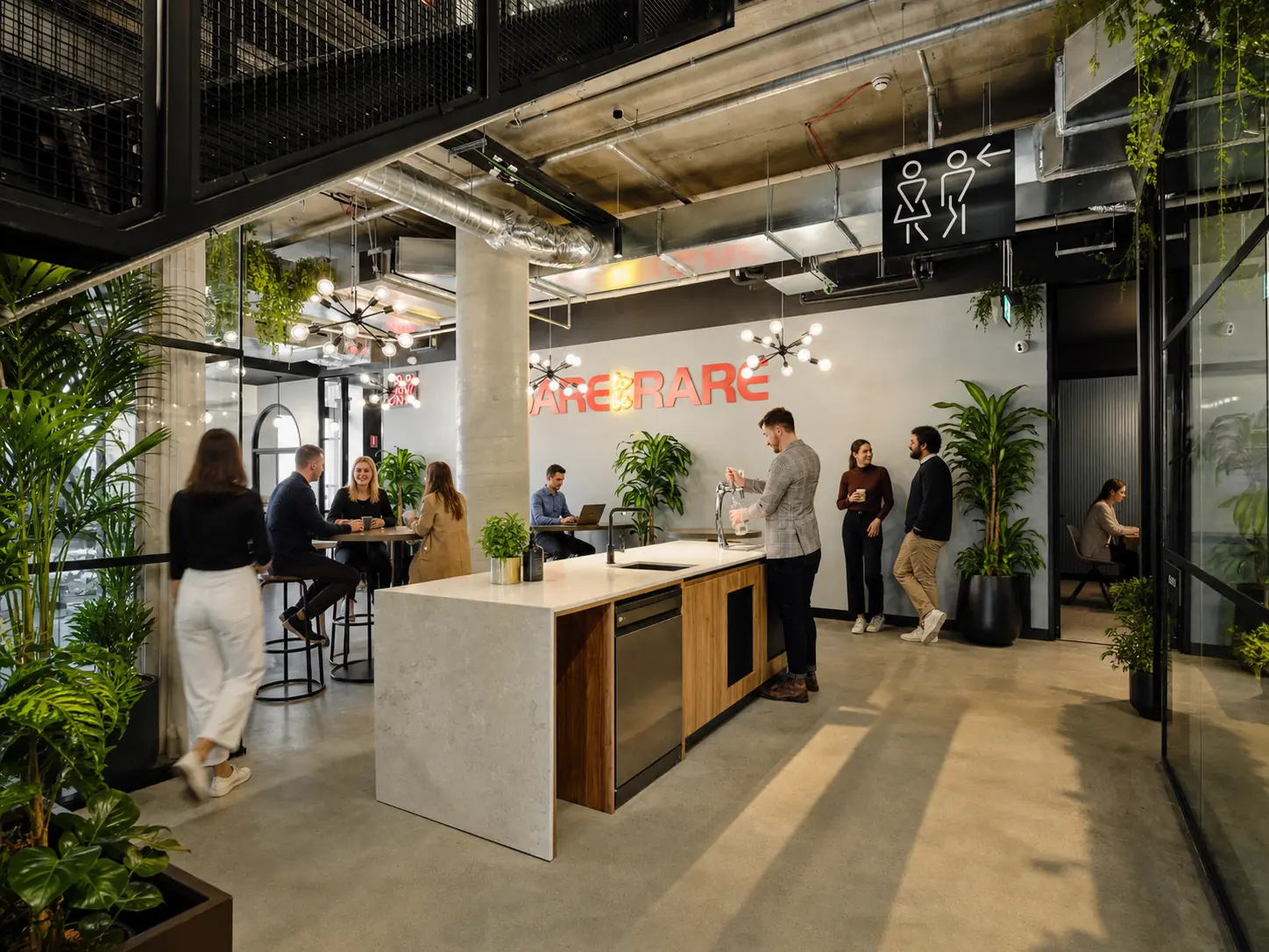 Growing professional team working inside a serviced private office at CorporateCubes.Co