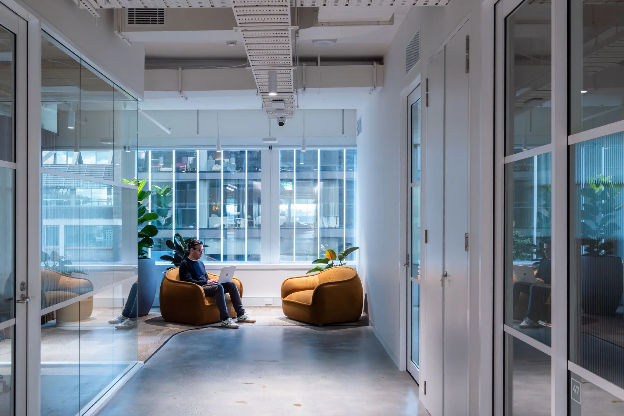 Professional services team meeting in a private office at CorporateCubes.Co