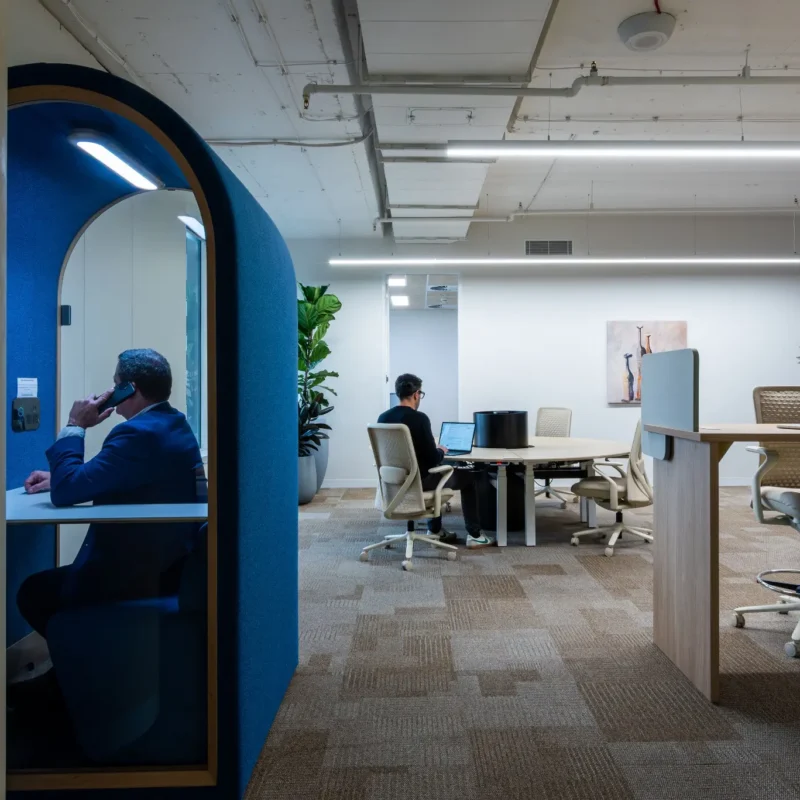 Growing team comparing coworking memberships in a flexible CorporateCubes.Co workspace