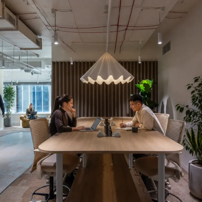Corporate team improving office space utilisation in a flexible Australian workspace