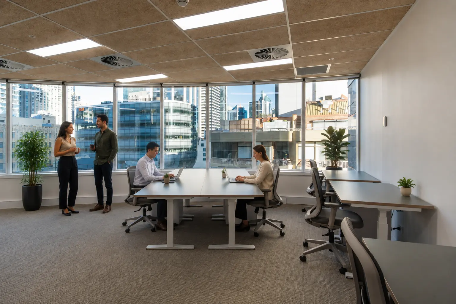 Small team collaborating in a move-in-ready private office space at CorporateCubes.Co