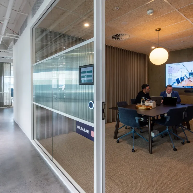 Professional services team working in a flexible private office in Australia