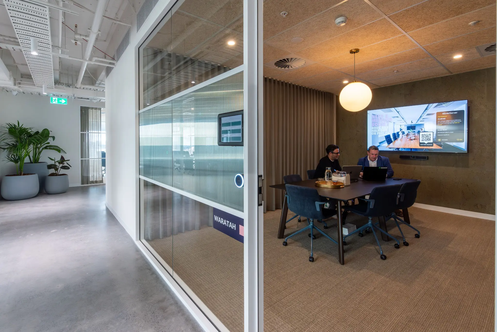 Professional services team working in a flexible private office in Australia